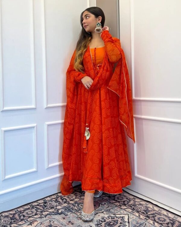 orange   Fox Gorgette round  neck potali button gown with  Four side fancy lace broder dupatta
